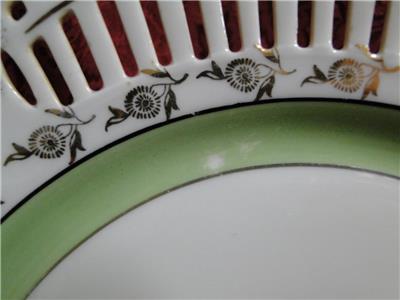 White Reticulated Plate w/ Gold Flowers, Green Band, Lady in Center, 10 1/2"
